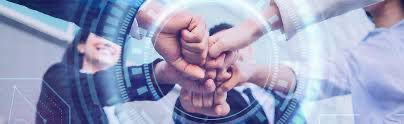 Team collaboration and unity - multiple hands coming together in partnership